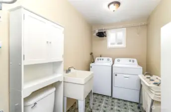 Laundry Room with Half Bath and Storage