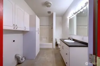 Full kitchen and bath in this oversized garage with plenty of extra storage in the attic. Notice the extra laundry hook ups.