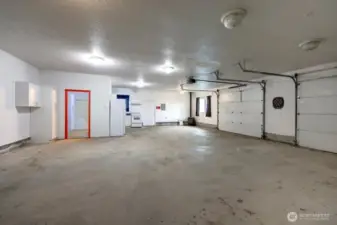 Full kitchen and bath in this oversized garage with plenty of extra storage in the attic.