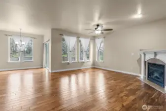 Natural light pours in, highlighting the warmth of the Acacia hardwoods