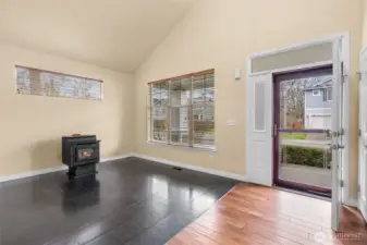 A welcoming front flex space with vaulted ceilings