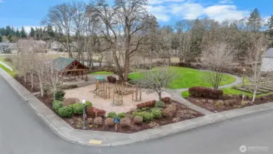 Just steps from your front door, a neighborhood park with open green space, play structures, and a covered pavilion
