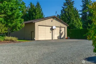 Incredible heated 2400 sqft shop 10+ car parking, office, loft finished spaces and Covered RV parking behind.  Seperate meter for gas and power