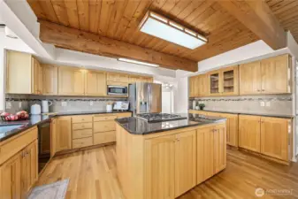 Beautifully updated kitchen with cedar finishes, hardwoods and granite.