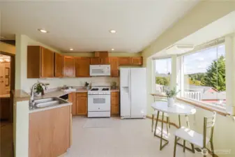 The kitchen with breakfast nook and the views are stunning from here as well.