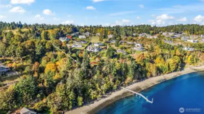 No expense spared with most site work completed. A dock with steel pilings, a large stone bulkhead with steps to the beach and a paver with with drainage and retaining walls provide the owner the opportunity to begin plans for the home.