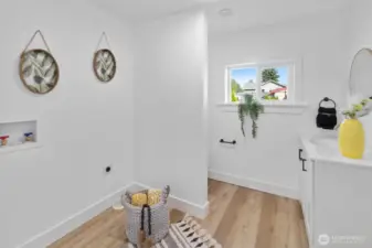 extra bathroom tucked away in laundry room