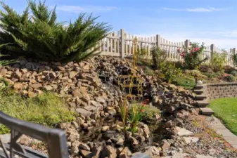 Mature landscaping with fountain