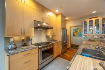 Chef's kitchen with Wolf cooktop / oven.