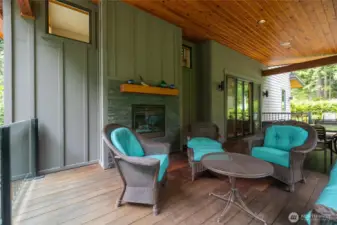 Beautiful covered outdoor area with gas fireplace for year round entertaining.