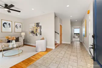 Welcome! Garage entrance to the right; large coat closet passed the stairs on the left