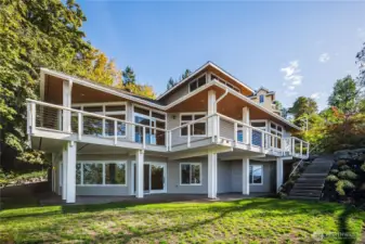 Unobstructed Views with this private custom built home. Two living areas and primary on the mail level.