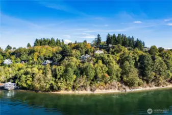 Looking back at the house and down embankment