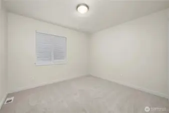 One of three additional generous top floor bedrooms