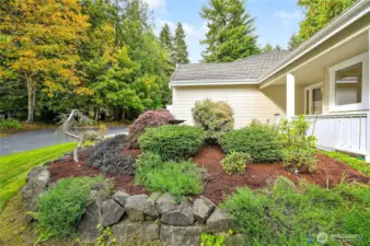 Enjoy your private yard and beautiful surroundings in this duplex-style condo with an oversized, two-car garage.