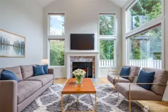 The living room with virtual staging shows one of many ways to decorate this warm and inviting home.