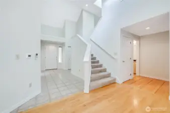The stairs ascend to a loft and a guest bedroom featuring a full private bath.