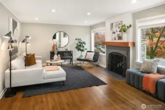 Upon entering, note the rich hardwood floors and abundant natural light.