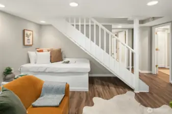 Under the stairs is a sweet little nook for reading or relaxing.