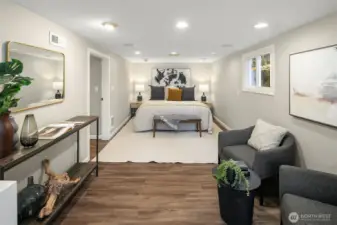 This room has so many potential uses! It could make a wonderful recreation room, home office, or even a rental space.