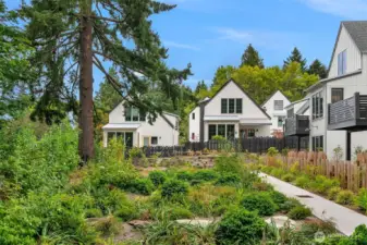 Lush common area gardens are professionally maintained and add beauty year round to the community.