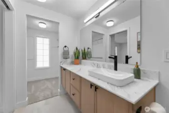 Primary bathroom extends to walk-in closet.