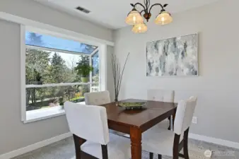 A dining room with a nice territorial view!
