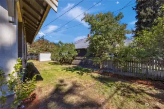 Lots of fun to be had in this side yard complimented with the wonderful scent of flowering lilacs and seasonal fruit from your own Italian plum tree.