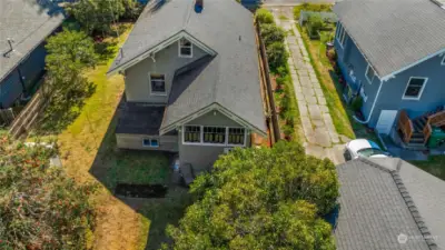 Arial view doesn't show the entire back yard. Driveway on the right side belongs to the neighbor