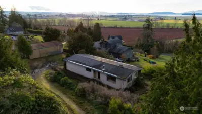 Looking at the home from above you can see the potential and it is SURROUNDED by lovely, newer homes.