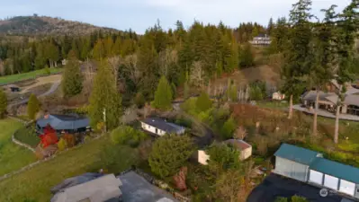 Looking at the surrounding homes and mountains.