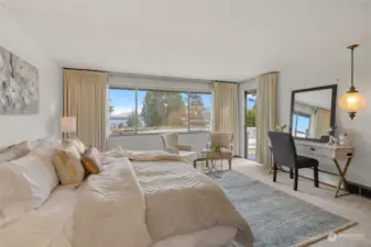 Primary Bedroom has a great view of the pool and the Cascades