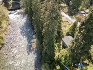 That's the home, there, on the right. High bank river front - NOT in the flood zone so no flood insurance needed.