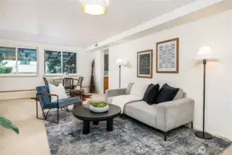 Loads of space on this lower level for desk, large couch and dining area