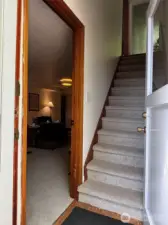Newly-carpeted interior stairs, as seen from separate downstairs exterior entrance to lower unit