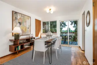 Main floor dining space is generous...and large pantry area and sliders to east-facing deck