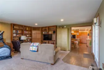 Bonus room with built in desk, book shelves and entertainment area.