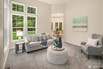 Living room flows into formal dining space.