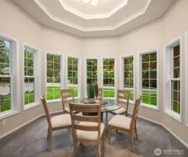 Soaring cantilevered ceiling in formal dining room.