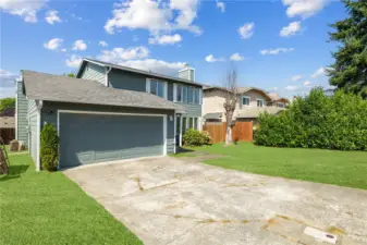 long driveway and 2-car garage