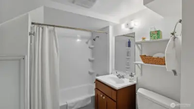 Full bath conveniently located off the downstairs studio room.