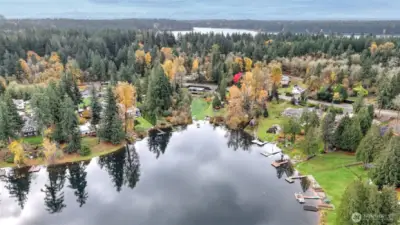Serene waterfront living on Shady Lake in Renton, WA! This stunning lake house boasts breathtaking views, private lake frontage, and a tranquil atmosphere perfect for relaxation and outdoor adventures.