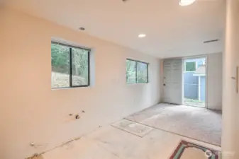 Plumbing and electrical for kitchen on wall