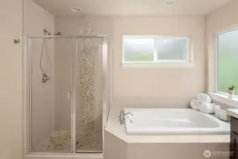 Clean and fresh 5 piece master bath suite.