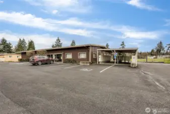 Main office and club house with covered mailboxes to the left.