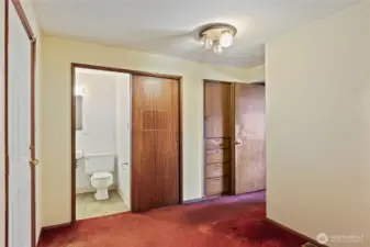 Transition room with quirky cloet toilet.