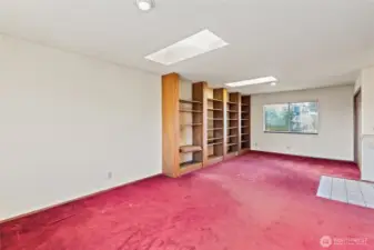 Family room with built-in shelves.