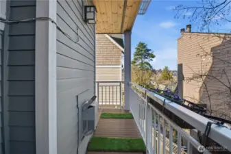 The first of three outdoor spaces, perfect for a dog run, additional storage, and featuring a gas hookup for easy BBQing.