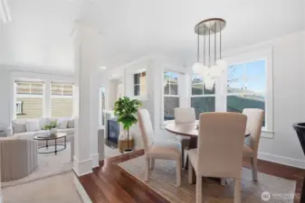 The lofted dining space introduces dimension and intention to the main level, offering elevated sightlines and an ideal setting for both everyday meals and late-night entertaining.