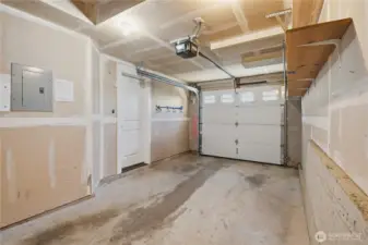 We’re back down at the entry level, where you’ll find a full-size garage off of an expansive entry foyer.